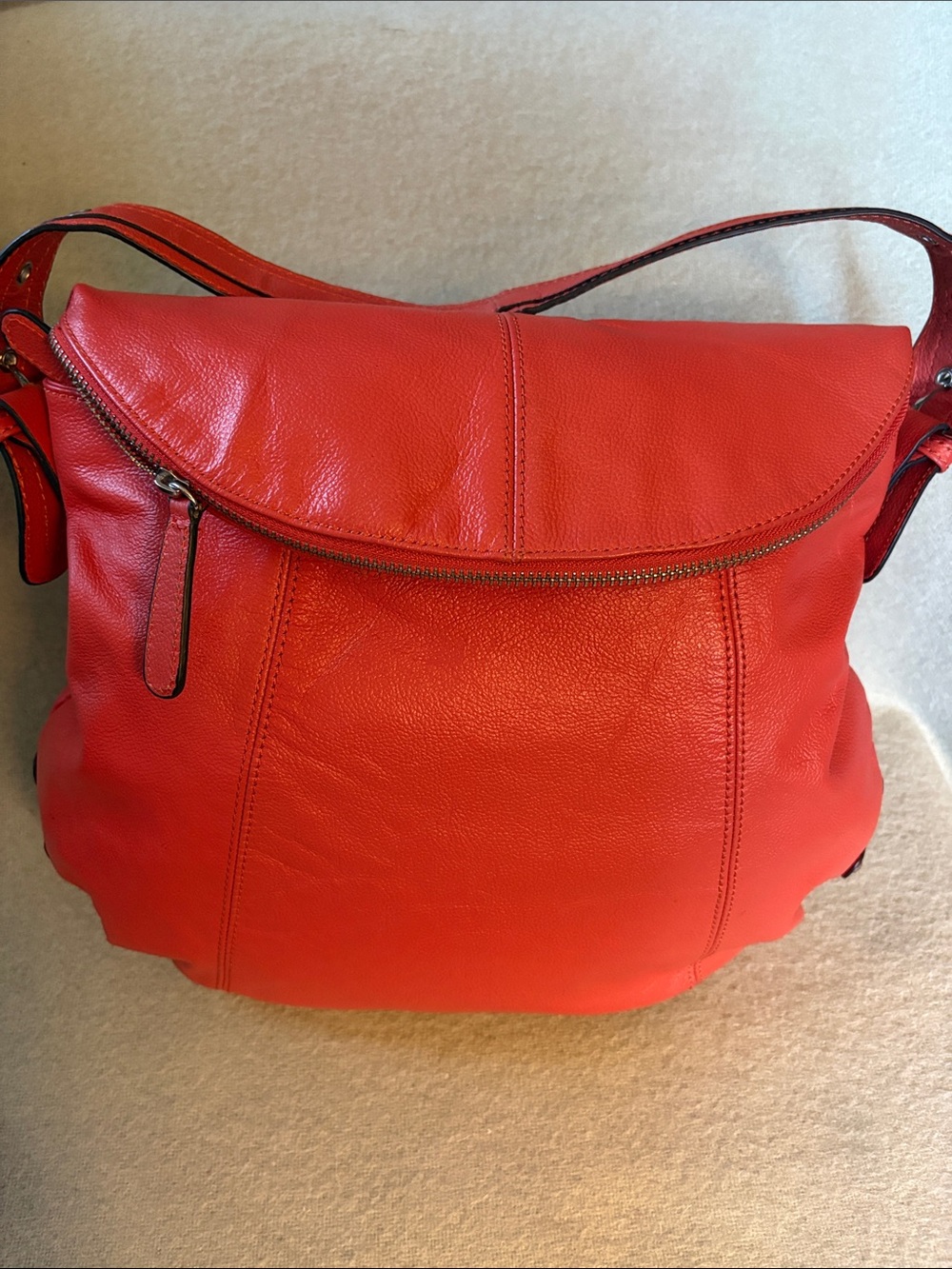 Vibrant Red Leather Shoulder Bag with Curved Zip Flap